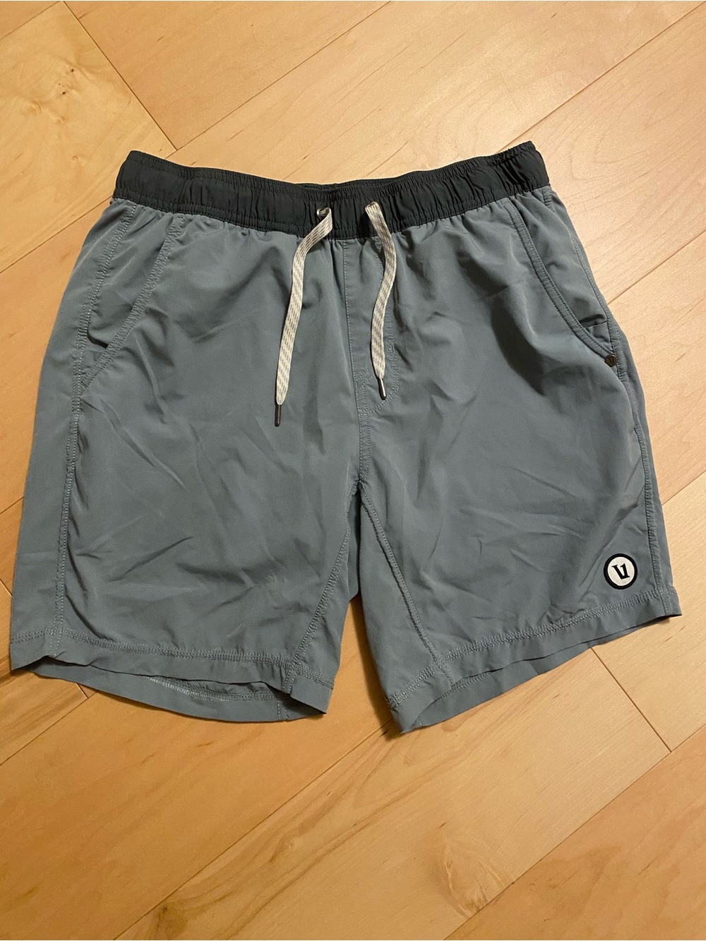 Vuori Men's Slate Blue Athletic Shorts with gray Waistband. Lined. Size medium